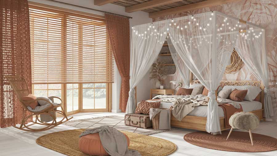 Elegantes Schlafzimmer mit vielen Naturmaterialien mit Himmelbett (de.depositphotos.com)